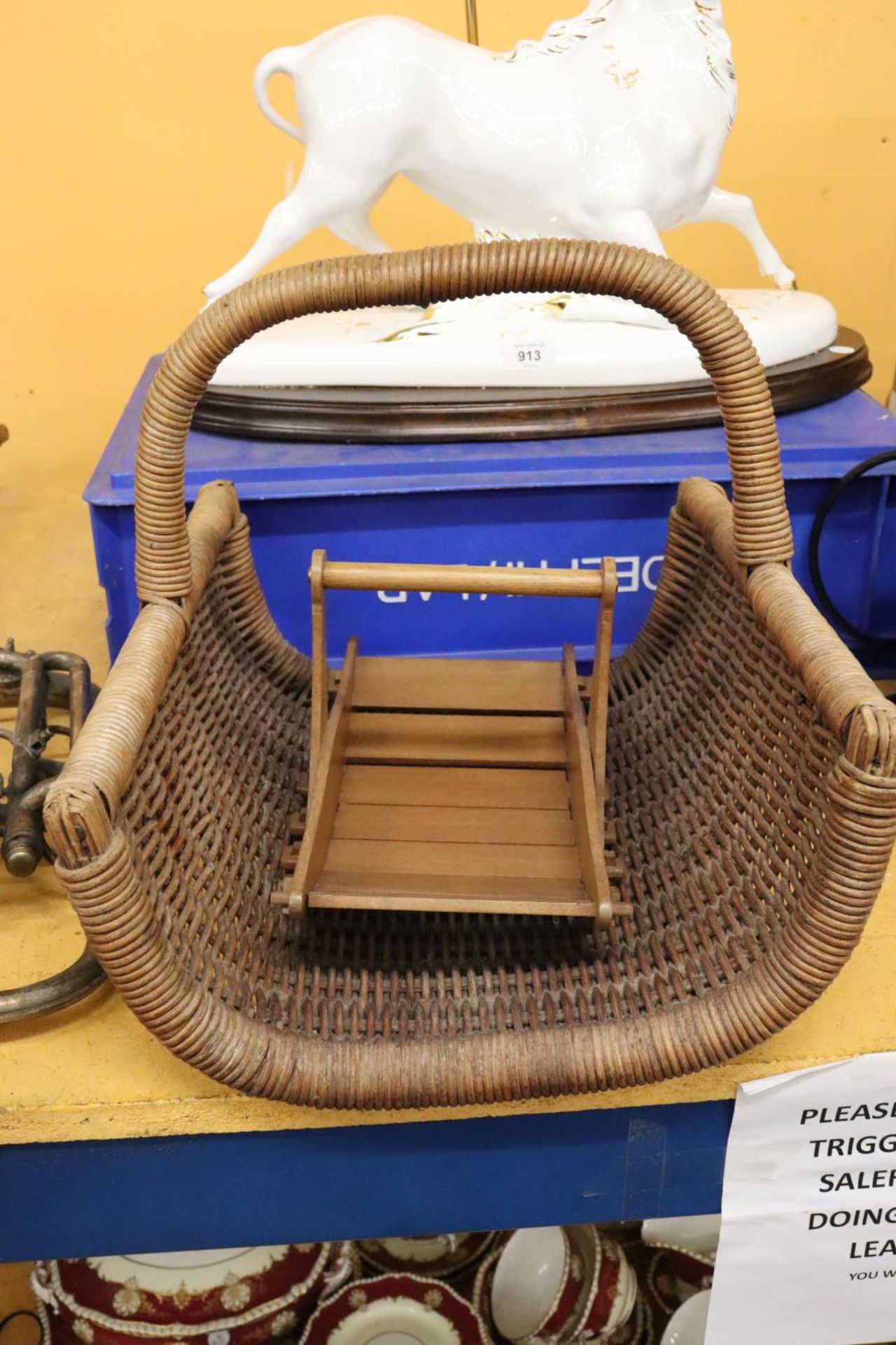 A LARGE BASKET TRUG AND A SMALLER WOODEN ONE