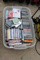 AN ASSORTMENT OF VARIOUS CDS AND DVDS