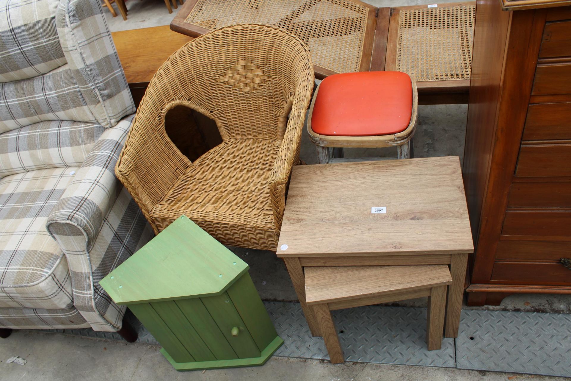 A WICKER CONSERVATORY CHAIR, 1950'S STOOL, NEST OF TWO TABLES AND SMALL CORNER CUPBOARD