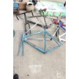 THREE VARIOUS BIKE FRAMES TO INCLUDE A CANNONDALE AND A PEUGEOT ETC