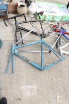 THREE VARIOUS BIKE FRAMES TO INCLUDE A CANNONDALE AND A PEUGEOT ETC