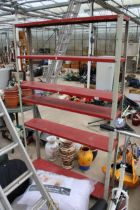 A FIVE TIER METAL WORKSHOP SHELVING UNIT