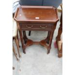 A MAHOGANY SIDE TABLE WITH CANTED CORNERS, SINGLE DRAWER AND MULTIPLE TURNED LEGS AND STRETCHERS