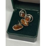 TWO PAIRS OF SILVER AND AMBER EARRINGS IN A PRESENTATION BOX