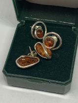 TWO PAIRS OF SILVER AND AMBER EARRINGS IN A PRESENTATION BOX