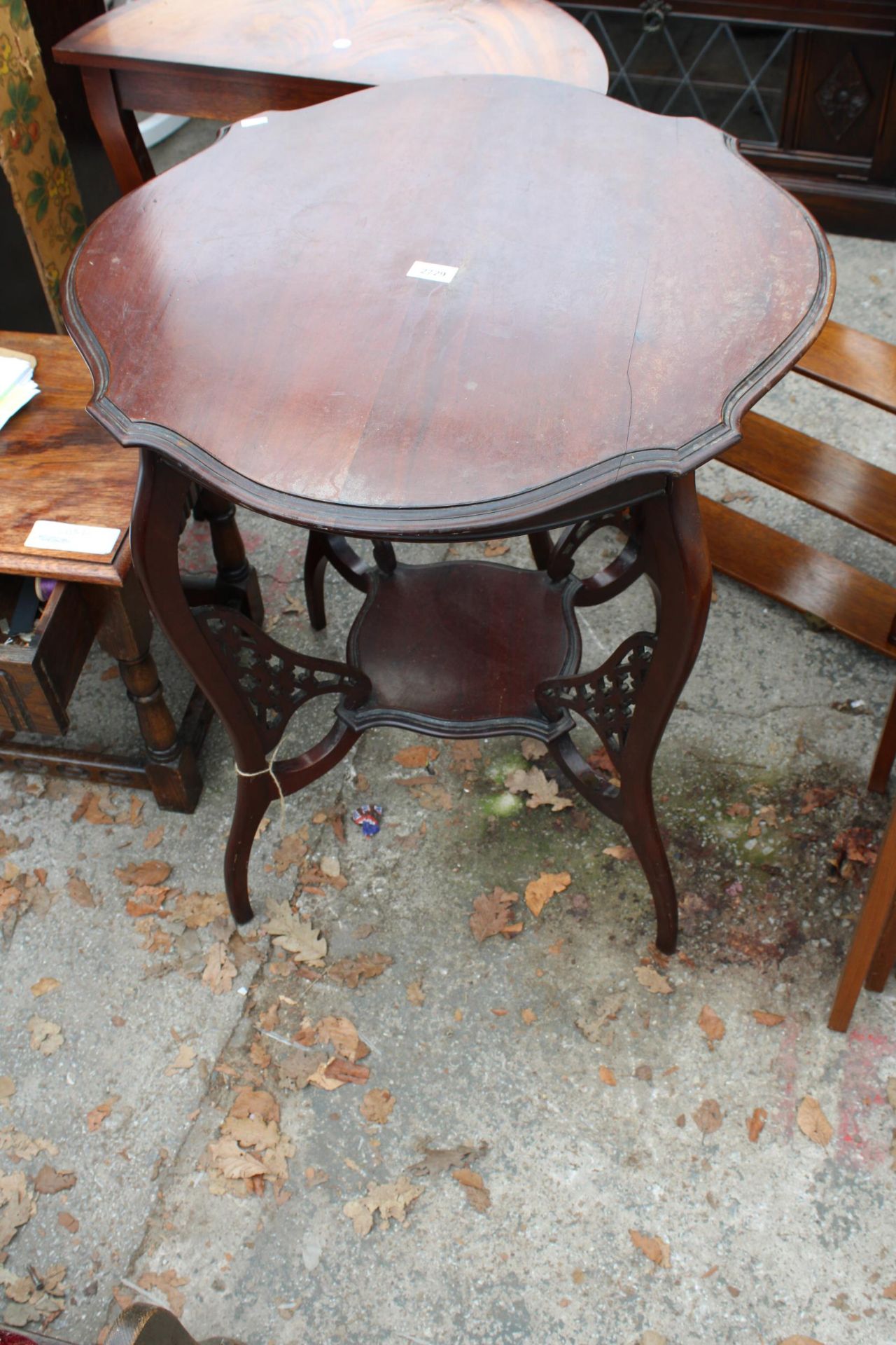 A LATE VICTORIAN MAHOGANY TWO TIER CENTRE TABLE 25" DIAMETER