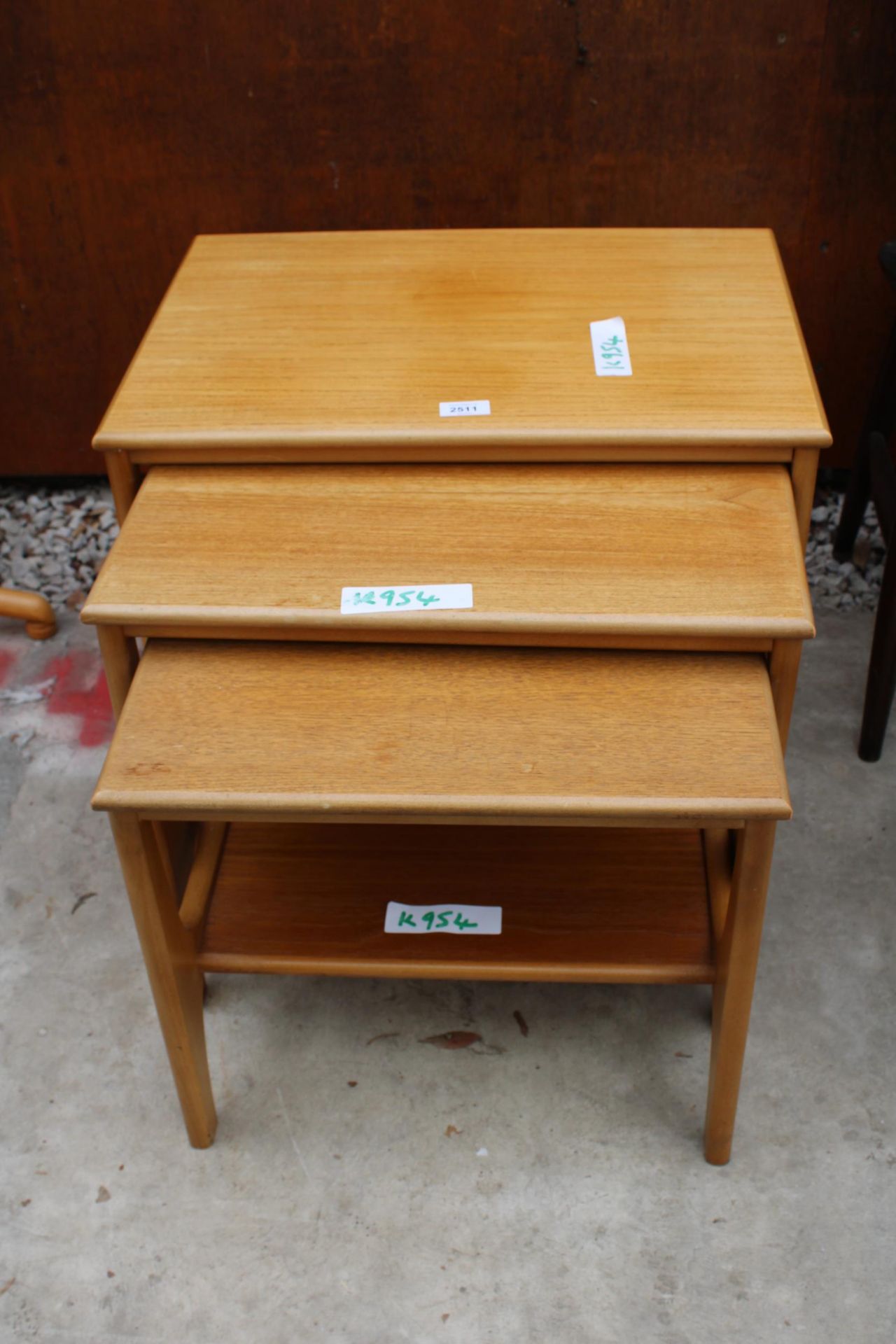 A RETRO TEAK NEST OF THREE TABLES - Image 2 of 3