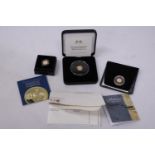 A SELECTION OF THREE GOLD COINS . 2023 QE11 MEMORIAL GOLD PROOF QUARTER LAUREL (ORIGINAL PRICE £