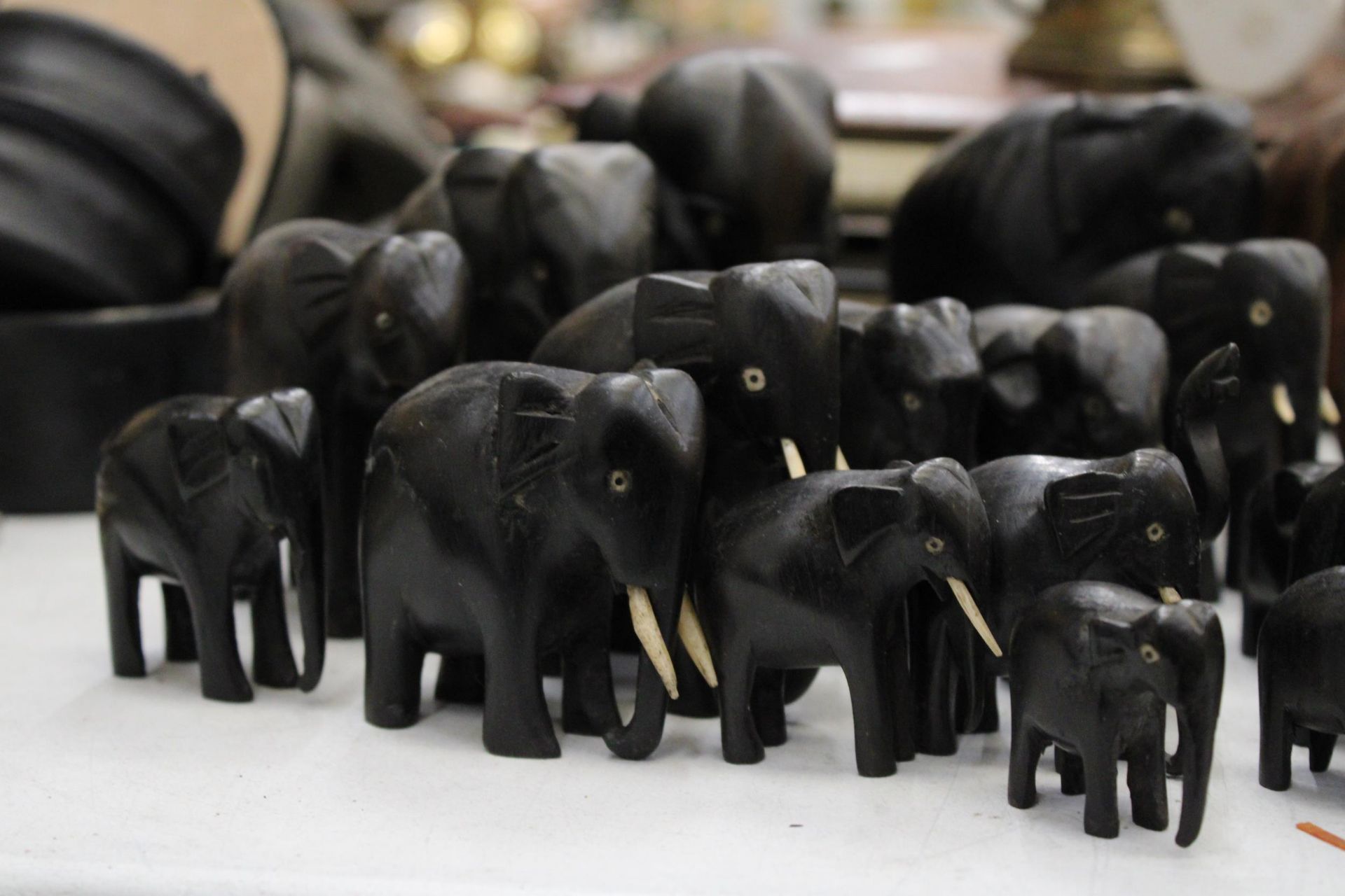 A LARGE COLLECTION OF VARIOUS SIZES OF WOODEN ASIAN ELEPHANTS - Image 2 of 6