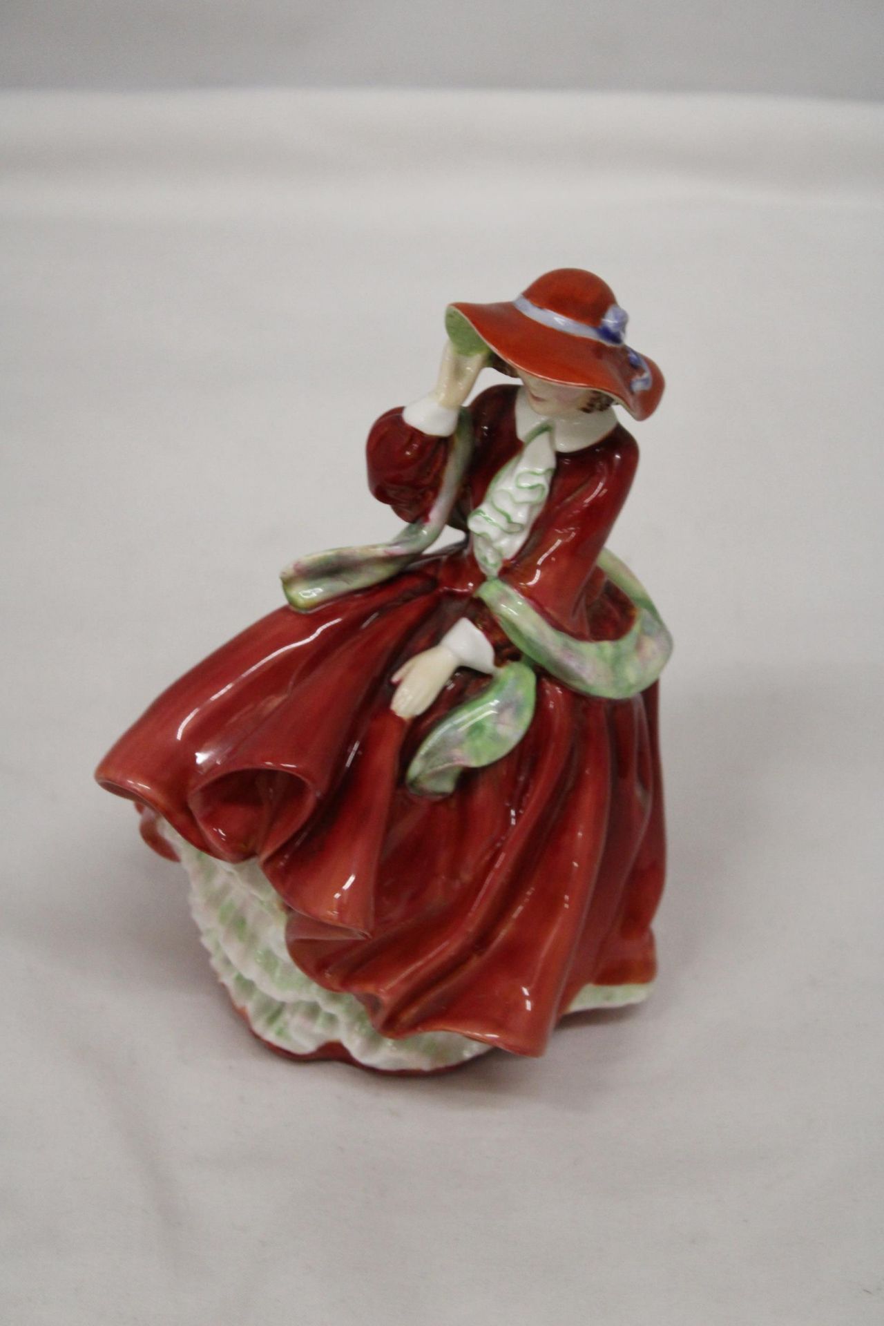 A ROYAL DOULTON FIGURE "TOP OF THE HILL" HN 1834