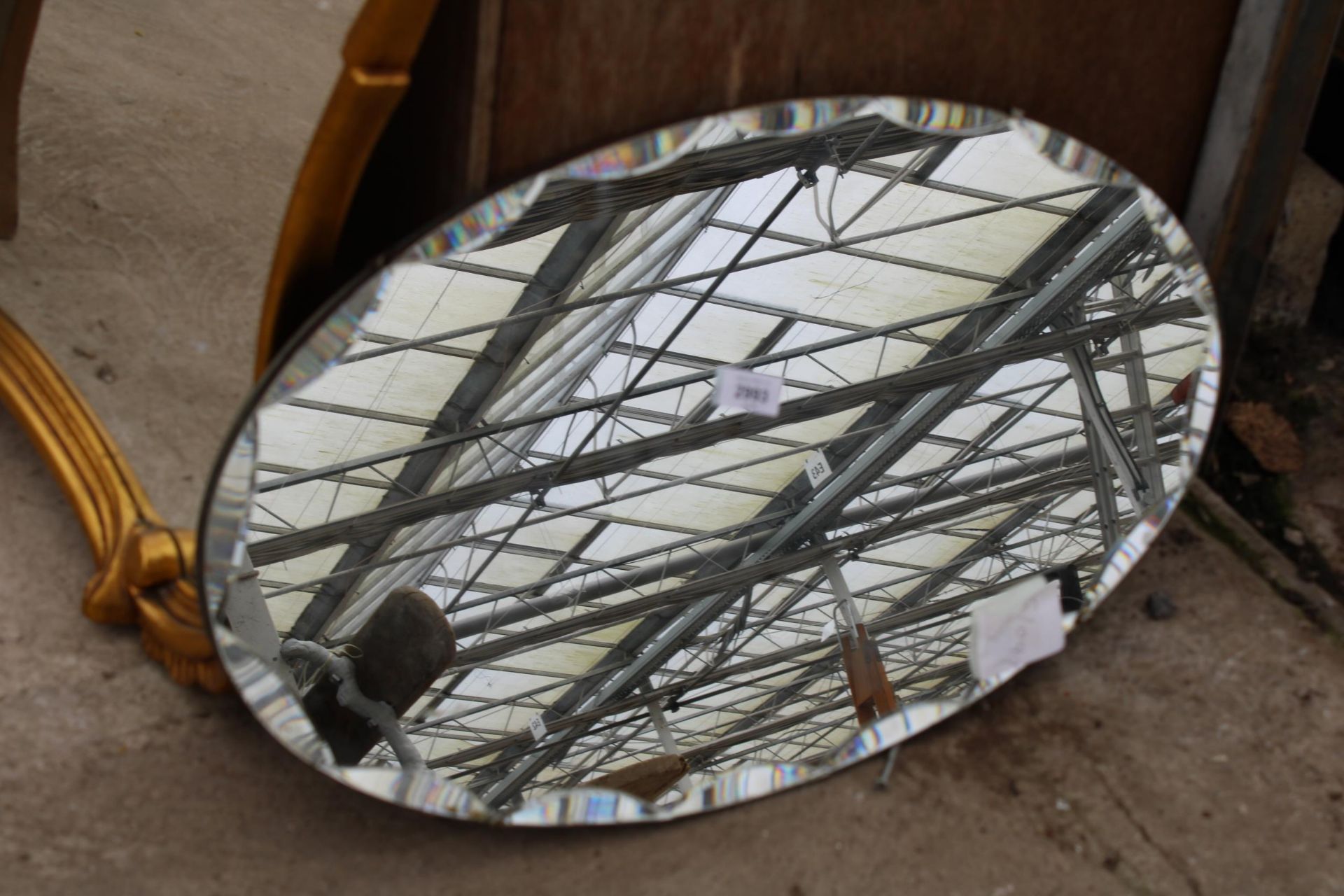 AN OVAL FRAMELESS WALL MIRROR, 26" X 15" - Image 2 of 2