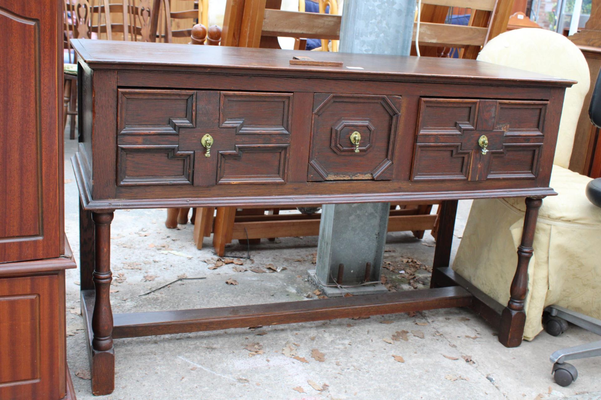 AN OAK JACOBEAN STYLE THREE DRAWER DRESSER BASE ON TURNED LEGS, 49.5" WIDE - Image 2 of 2