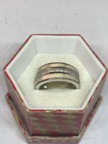 A SILVER DRESS RING