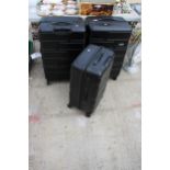 A SET OF THREE AMERICAN TOURISTER SUITCASES