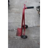 A RED METAL TWO WHEELED SACK TRUCK