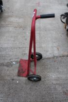 A RED METAL TWO WHEELED SACK TRUCK