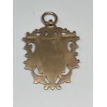 A 9 CARAT GOLD WATCH FOB GROSS WEIGHT 10.4 GRAMS