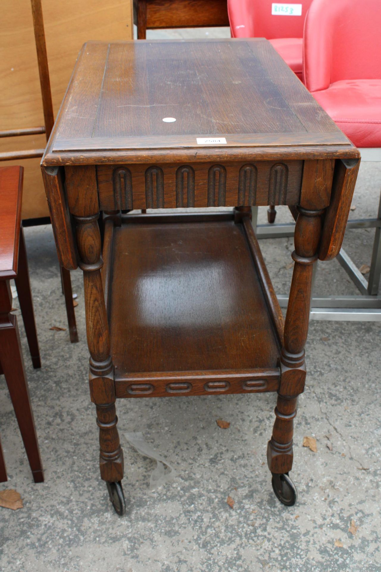 A MID 20TH CENTURY OAK TWO TIER DROP-LEAF TROLLEY - Image 2 of 2