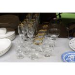A QUANTITY OF DRINKING GLASS AND DESSERT BOWLS