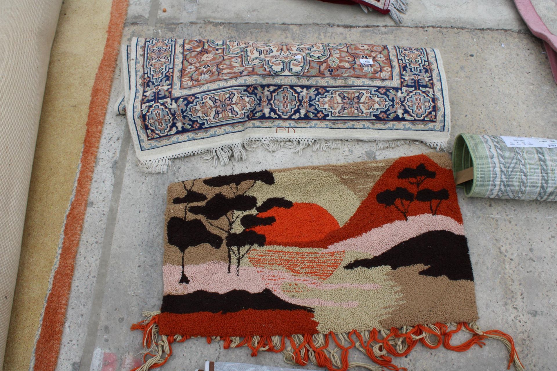 TWO VARIOUS PATTERNED RUGS