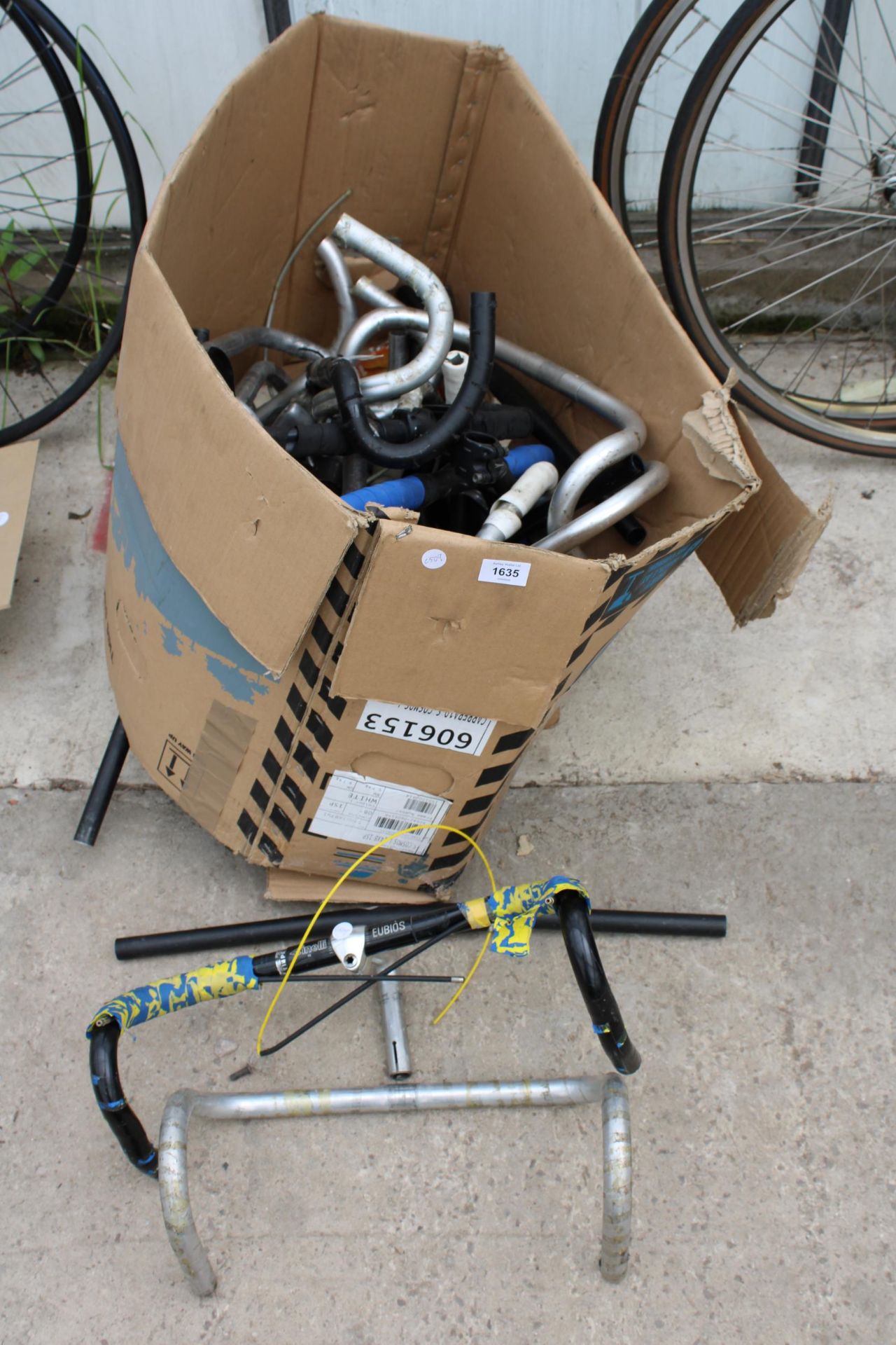 A LARGE COLLECTION OF VARIOUS BIKE HANDLE BARS