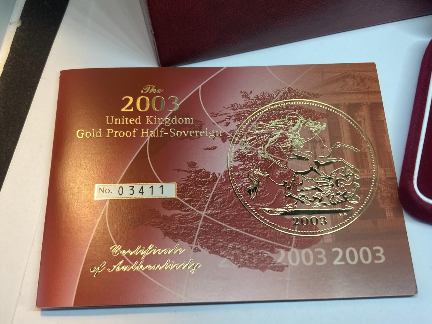 A 2003 GOLD PROOF HALF SOVEREIGN NO 03411 OF 10,000 IN A PRESENTATION BOX WITH CERTIFICATE OF - Image 4 of 5