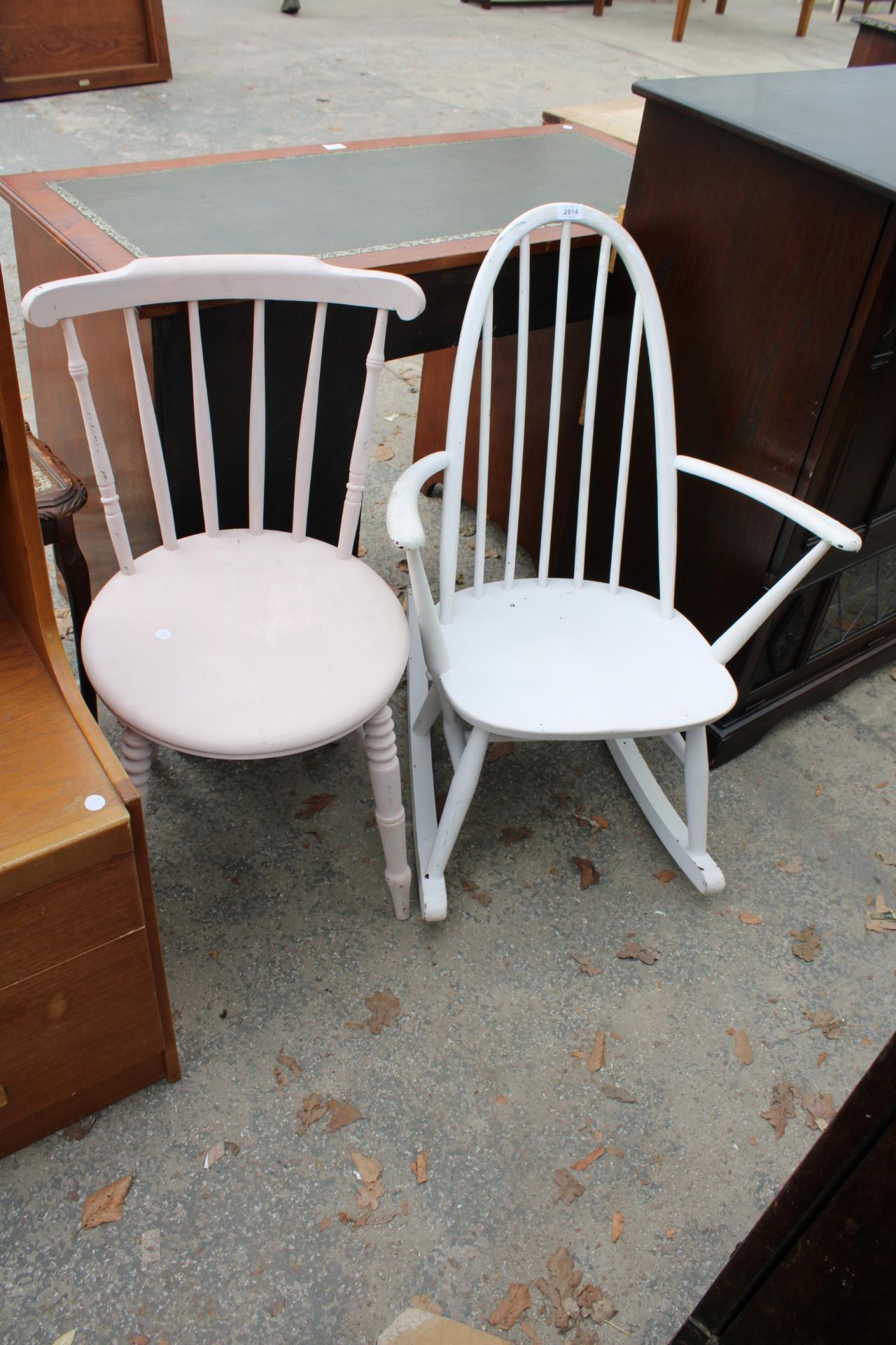 A PAINTED VICTORIAN KITCHEN CHAIR AND A PAINTED ERCOL STYLE ROCKING CHAIR
