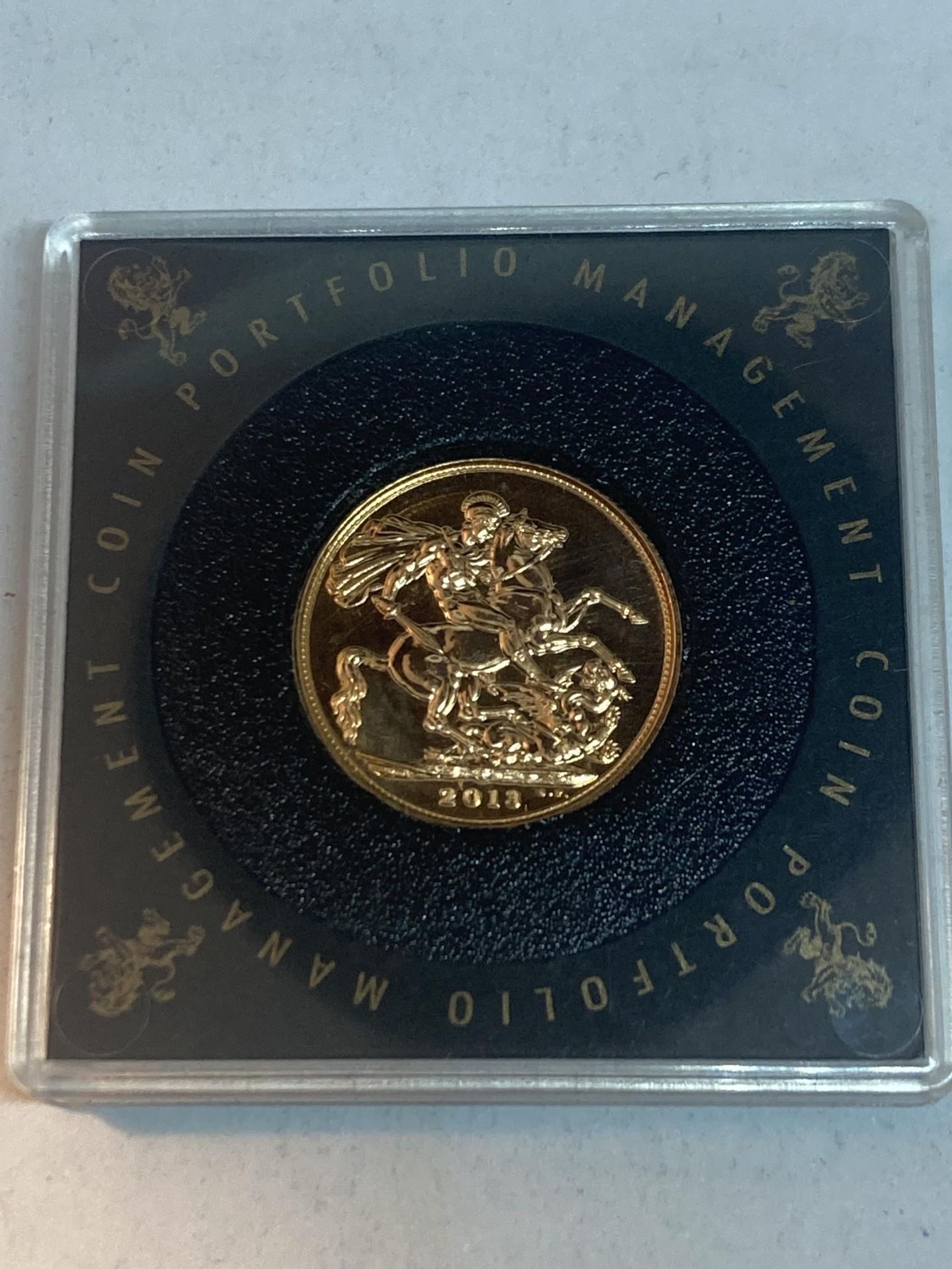 A CASED UNCIRCULATED GOLD SOVEREIGN DATED 2018