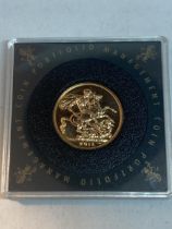 A CASED UNCIRCULATED GOLD SOVEREIGN DATED 2018