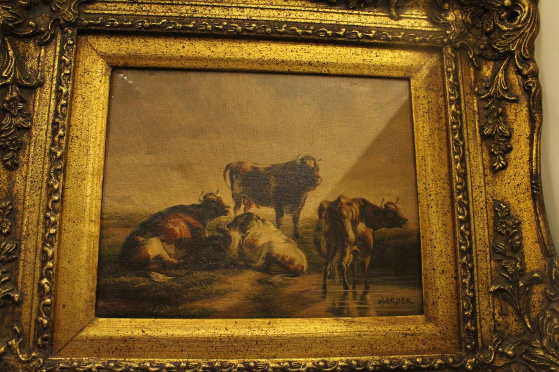 A GILT FRAMED OIL ON CANVAS SIGNED HARDER OF THREE COWS AND A BULL RESTING 19" X 25" - Image 2 of 6
