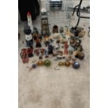 AN ASSORTMENT OF NAUTICAL RELATED ITEMS TO INCLUDE LIGHT HOUSES, SAILOR FIGURES AND ANIMALS ETC