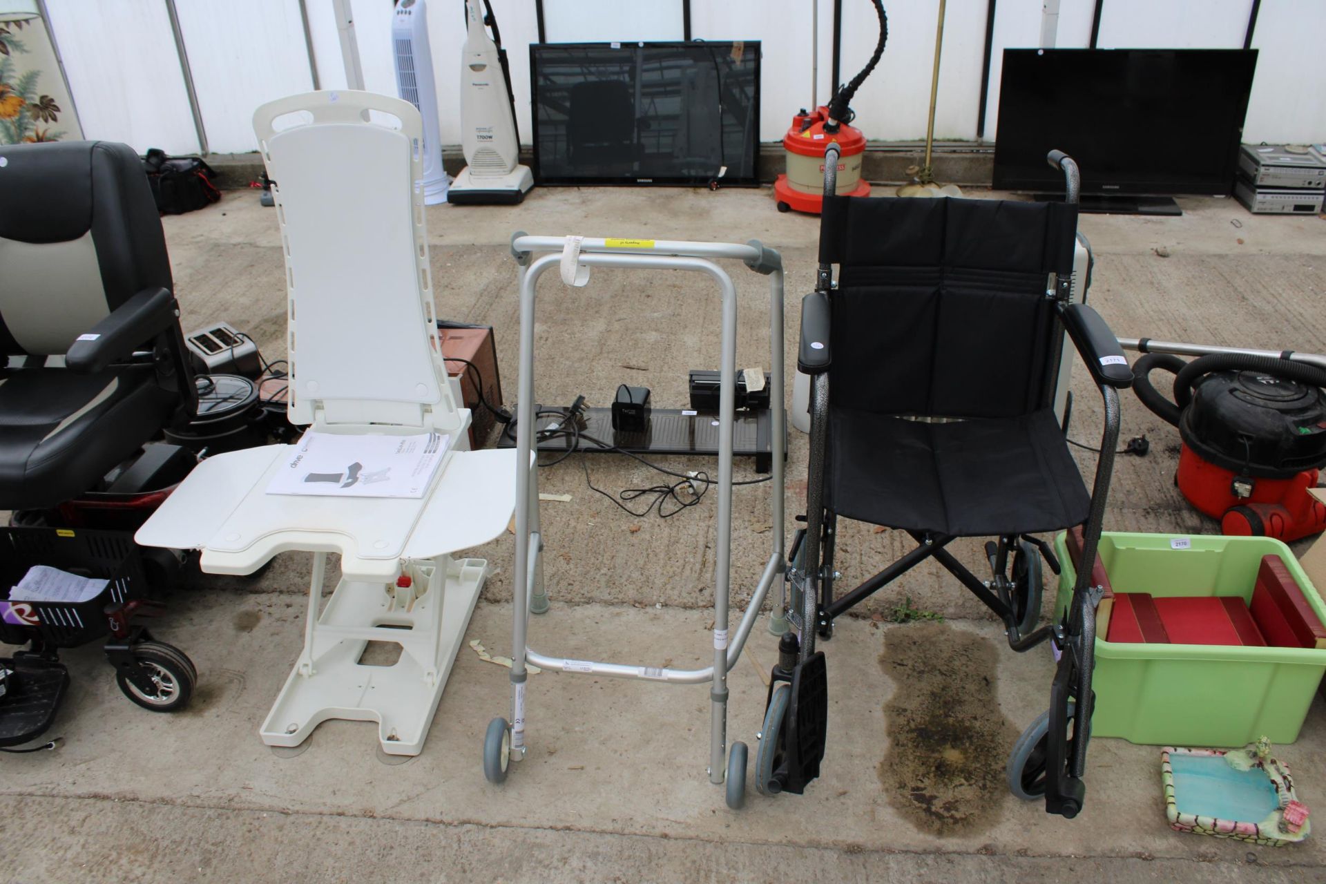 A MODERN WHEELCHAIR, WALKING FRAME AND BELLAVITA BATH LIFT