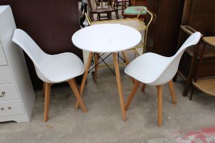 A WHITE MELAMINE TABLE ON KICK OUT LEGS 24" DIAMETER AND A PAIR OF SIMILAR CHAIRS