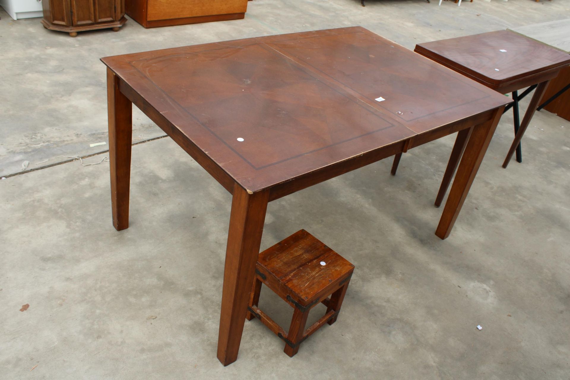 A LATE 20TH CENTURY DINING TABLE AND AN INDONESIAN WOOD STOOL