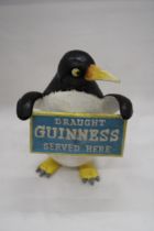 A DRAUGHT GUINNESS PENGUIN, HEIGHT 21CM