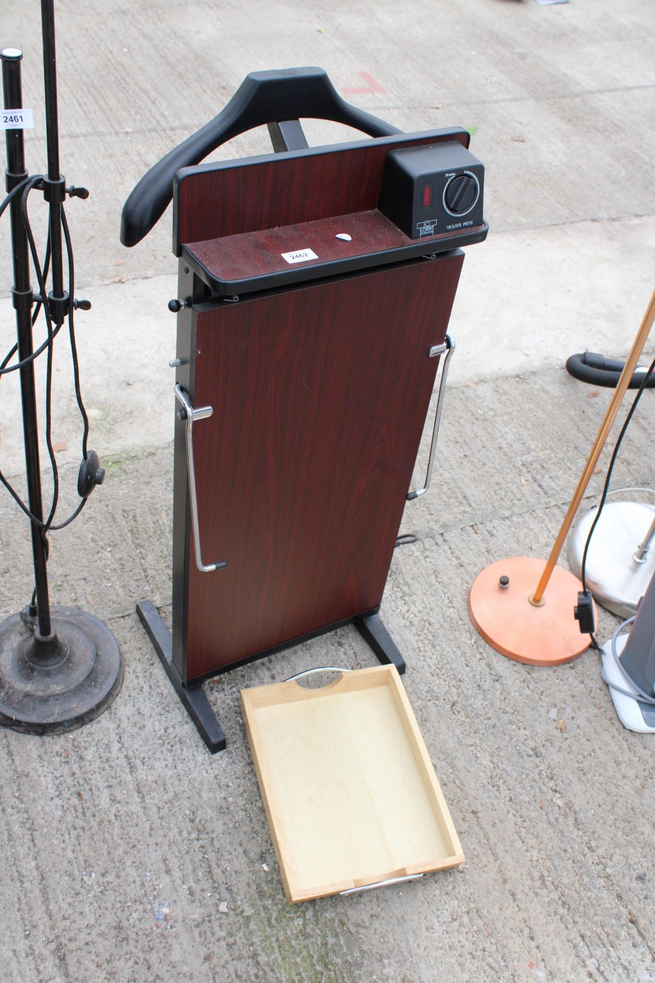 A TROUSSER PRESS AND A WOODEN TRAY