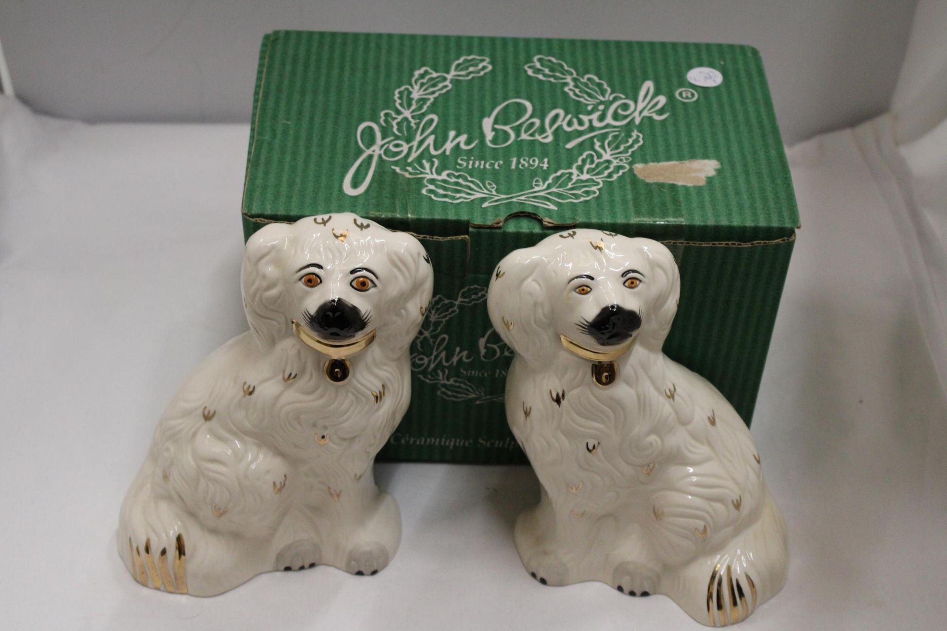 A LARGE SIZED PAIR OF ROYAL DOULTON SPANIEL DOGS IN ORIGINAL BOX