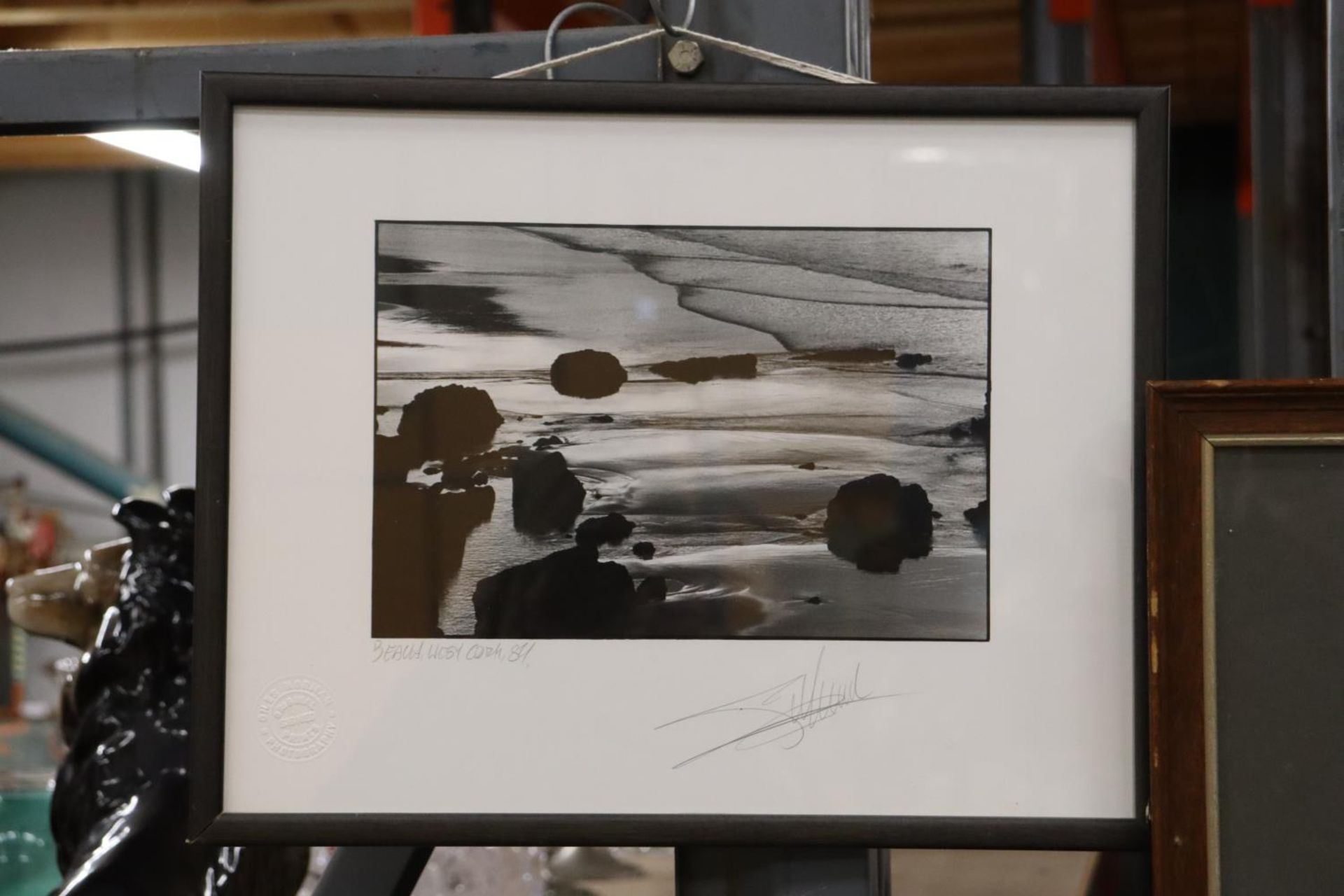 A FRAMED PHOTOGRAPHIC IMAGE OF THE SEA, SIGNED