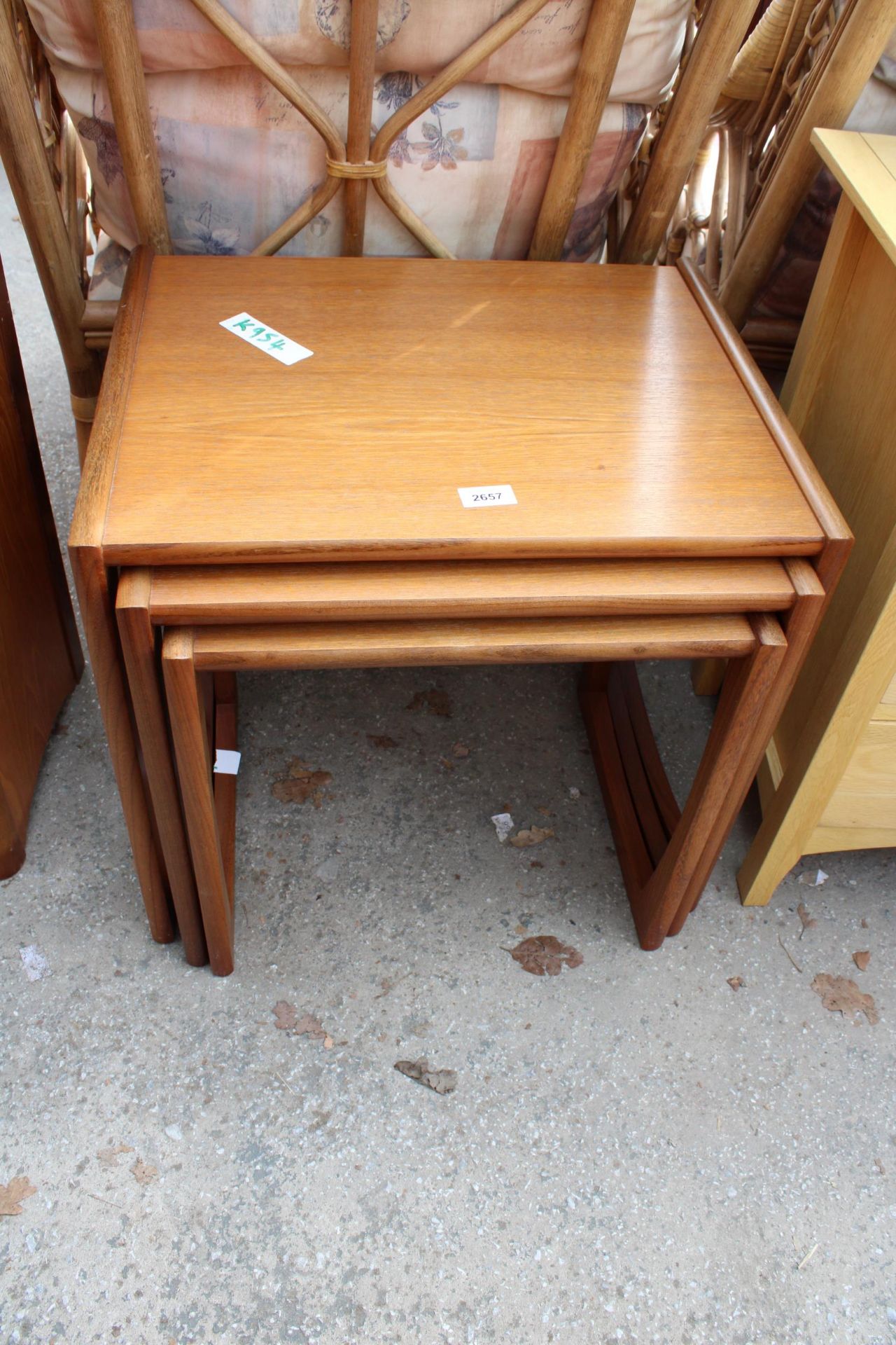 A RETRO TEAK NEST OF THREE G PLAN TABLES