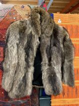 A VINTAGE RACCOON COAT