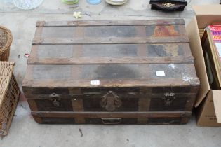 A VINTAGE WOODEN BANDED TRAVEL TRUNK