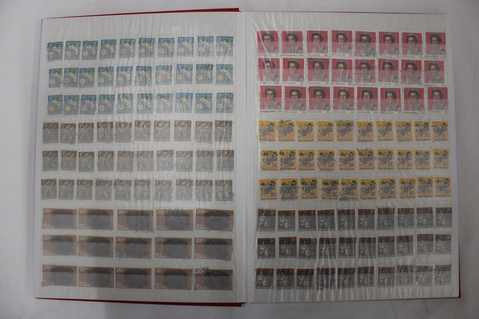 A FULL STOCK BOOK CONTAINING STAMPS OF NEW ZEALAND