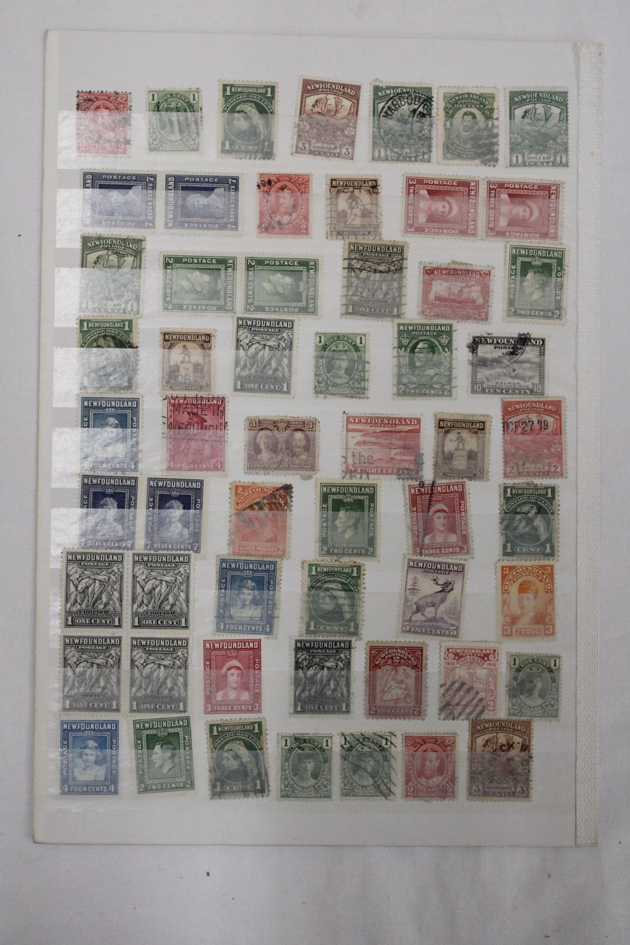 TWO PAGES OF NEWFOUNDLAND STAMPS