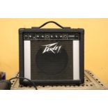 A PEAVEY LARGE SIZED GUITAR AMPLIFIER