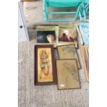AN ASSORTMENT OF FRAMED PRINTS AND MOZART BOOKS ETC