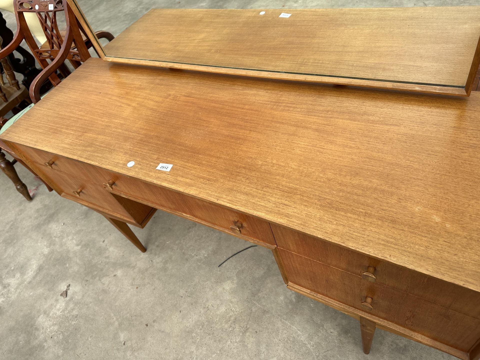 A MCINTOSH RETRO TEAK DRESSING TABLE ENCLOSING FIVE DRAWERS, 55.5" WIDE ON TAPERING LEGS - Image 3 of 5