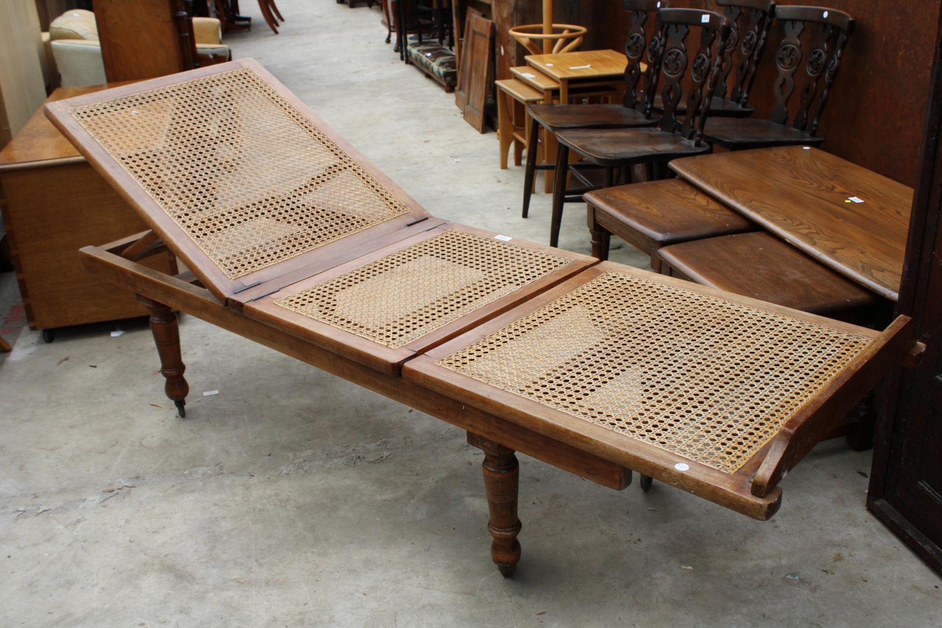 A LATE VICTORIAN HARDWOOD FOLDING DAY BED ON TURNED LEGS WITH SPLIT CANE SEATS/BACK - Image 7 of 7
