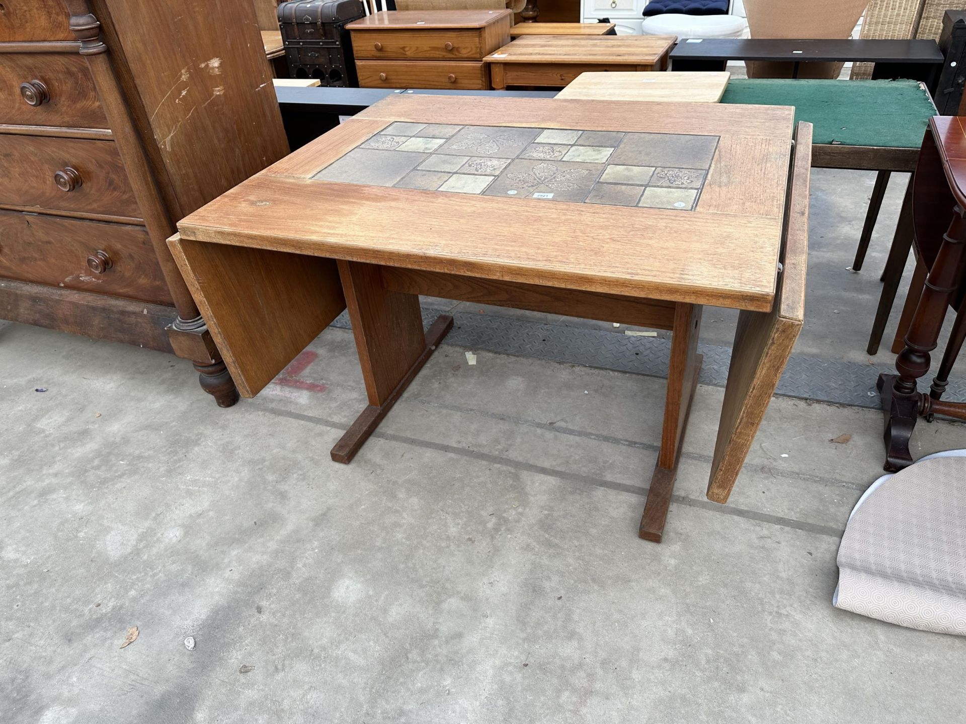 A RETRO TEAK GANSO MOBLER DROP-LEAF DINING TABLE WITH TILED TOP, 75" X 36" OPENED