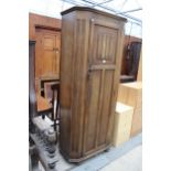 A MID 20TH CENTURY OAK LINEN-FOLD HALL WARDROBE, 32" WIDE