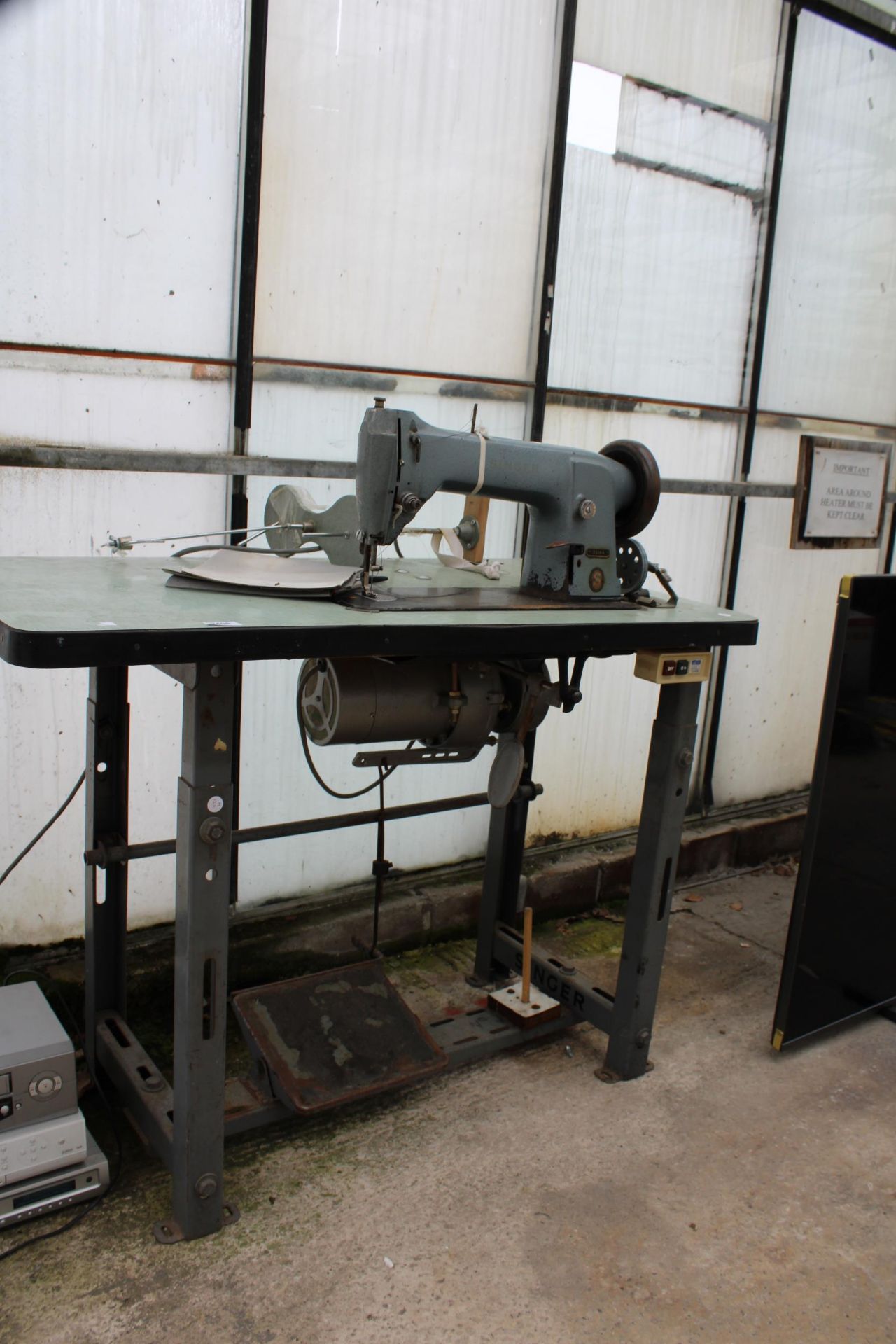 A VINTAGE SINGER INDUSTRIAL SEWING MACHINE WITH TREADLE BASE - Image 2 of 2